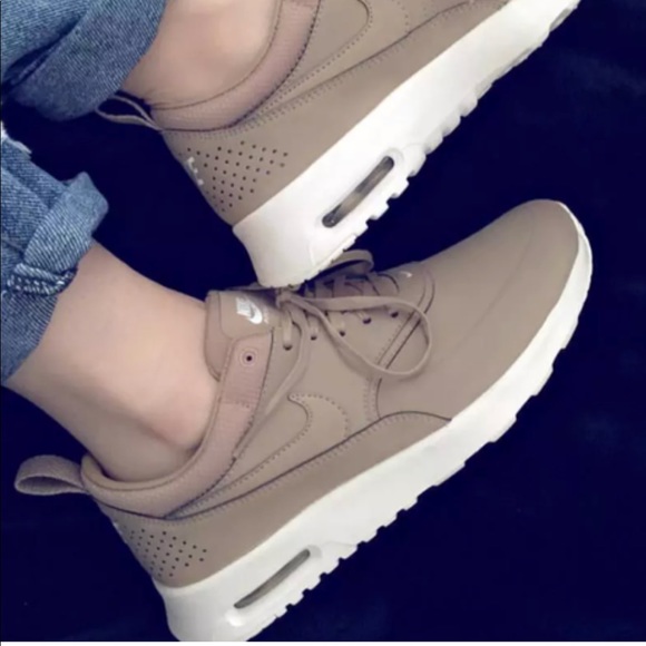 nike thea tan